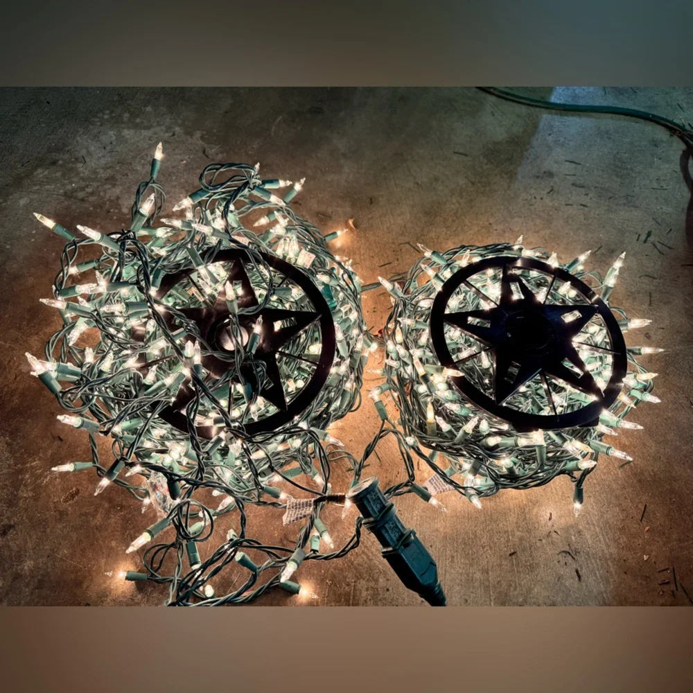 2 long White String Lights strands on storage wheels